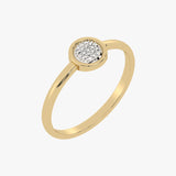 Gold ring with round bezel and white diamonds