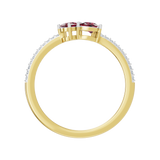 Gold ring with two rubies and diamonds