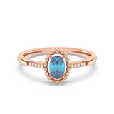 Ring with Oval Topaz