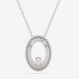 Owalny wisiorek vintage od Venetia Jewels z delikatnymi zdobieniami i srebrnym łańcuszkiem