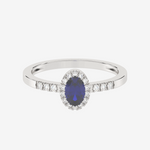 Elegancki pierścionek z niebieskim szafirem i diamentami w białym złocie od Venetia Jewels