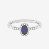Elegancki pierścionek z niebieskim szafirem i diamentami w białym złocie od Venetia Jewels
