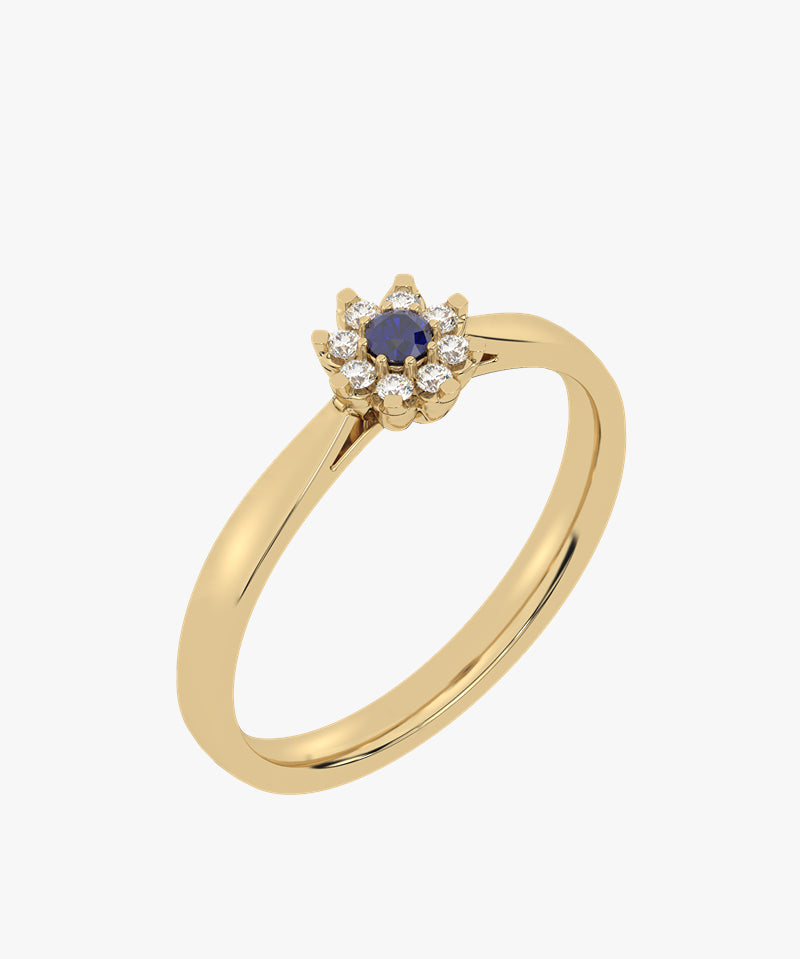 Złoty pierścionek z szafirem otoczony diamentami, elegancka biżuteria od Venetia Jewels