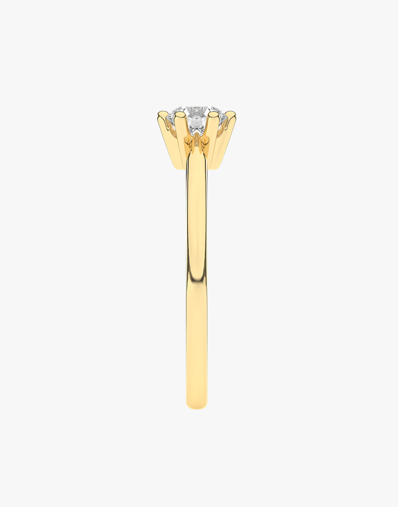 Złoty pierścionek zaręczynowy z brylantem od Venetia Jewels z eleganckim designem