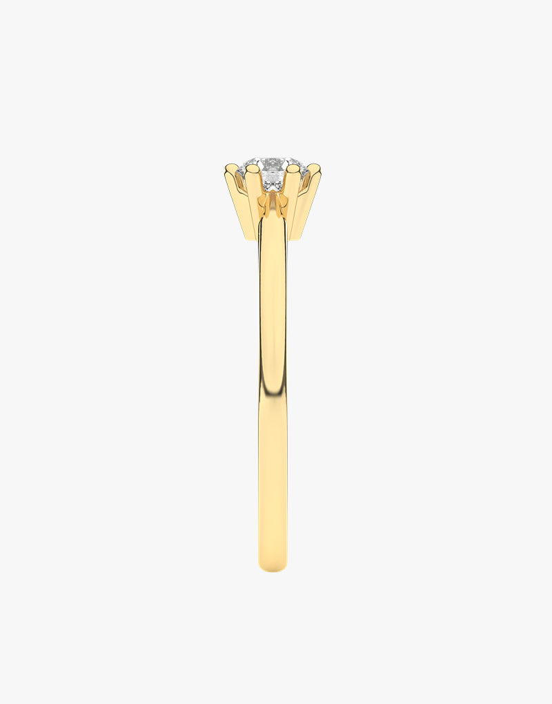 Złoty pierścionek zaręczynowy z brylantem od Venetia Jewels, elegancki i klasyczny design