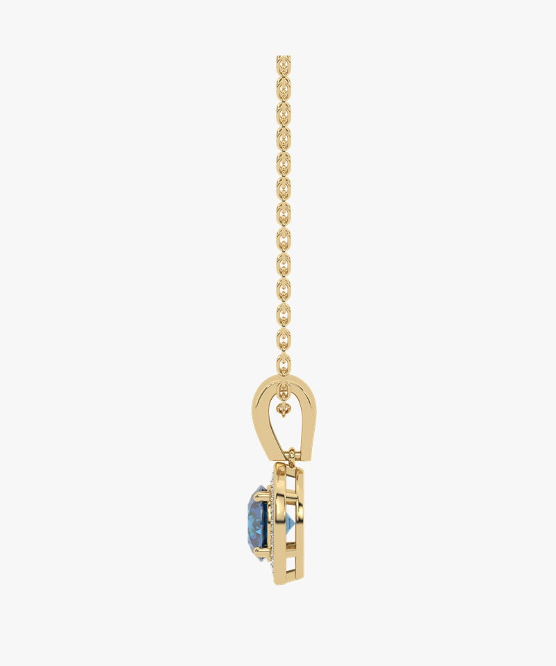 Złoty wisiorek z London Blue Topazem z eleganckim zawieszeniem od Venetia Jewels