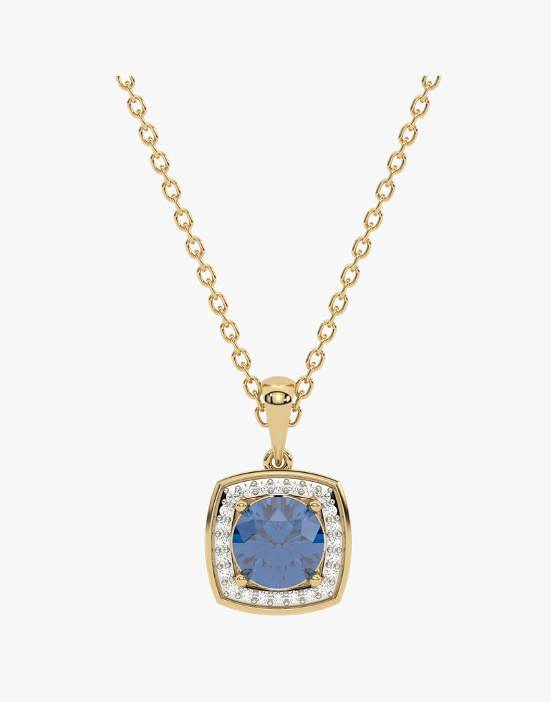 Złoty wisiorek z london blue topazem otoczony diamentami na eleganckim łańcuszku od Venetia Jewels