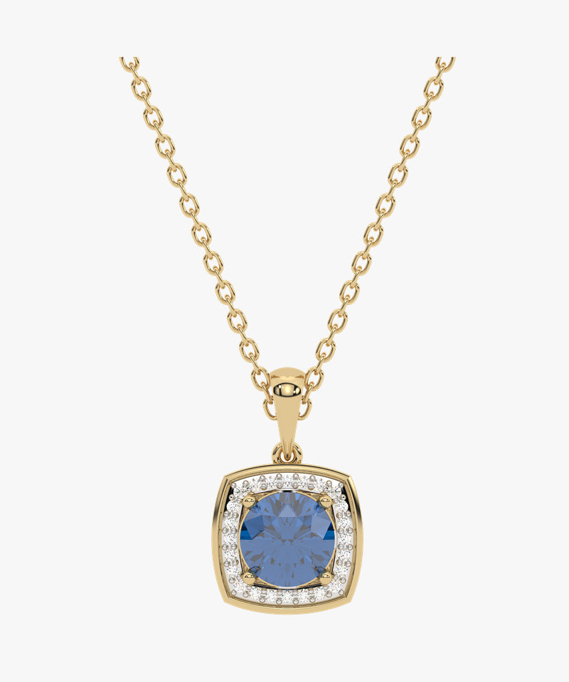 Złoty wisiorek z london blue topazem otoczony diamentami na eleganckim łańcuszku od Venetia Jewels