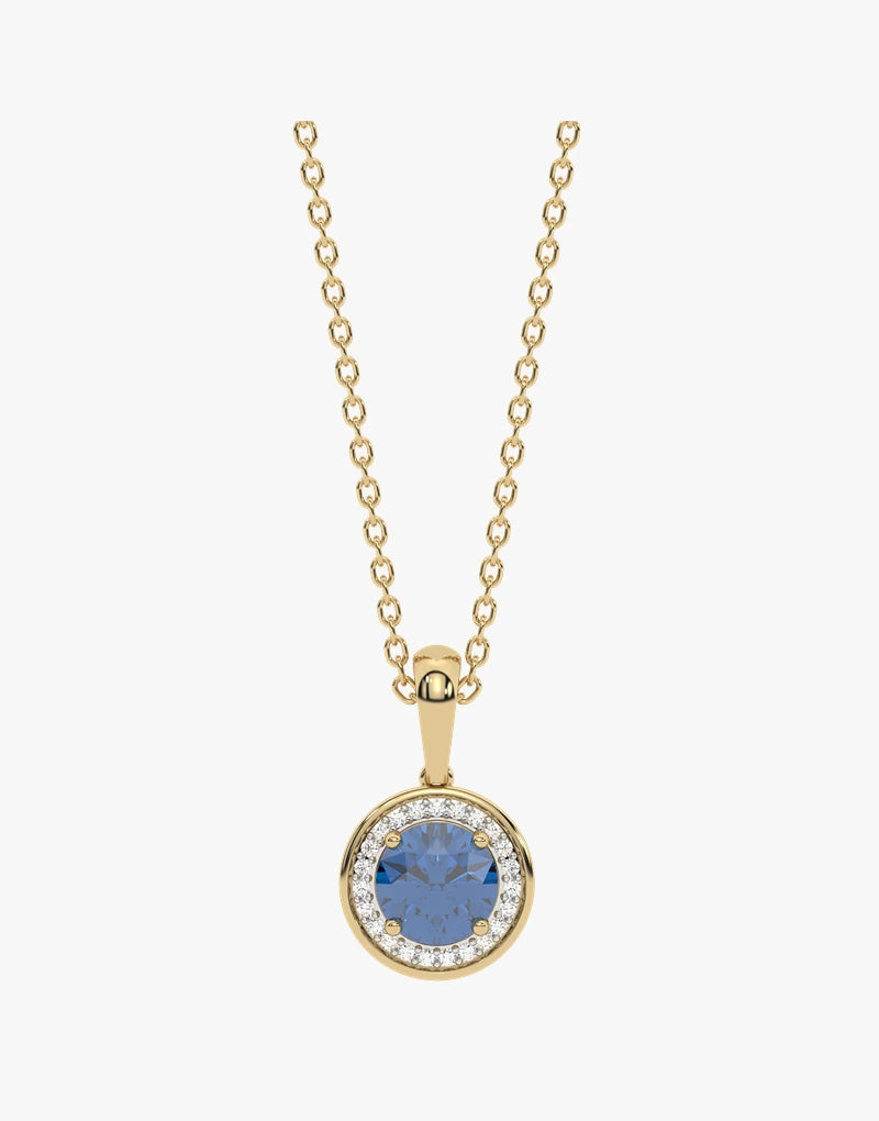 Złoty wisiorek z London Blue Topazem otoczony kryształami w eleganckim designie od Venetia Jewels