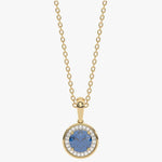 Złoty wisiorek z London Blue Topazem otoczony kryształami w eleganckim designie od Venetia Jewels