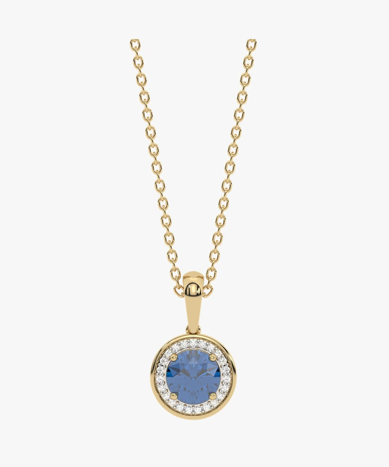 Złoty wisiorek z London Blue Topazem otoczony kryształami w eleganckim designie od Venetia Jewels