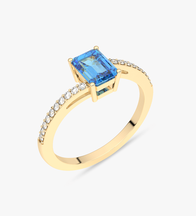 Elegancki pierścionek z topazem i brylantami w złotej oprawie, idealny na specjalne okazje