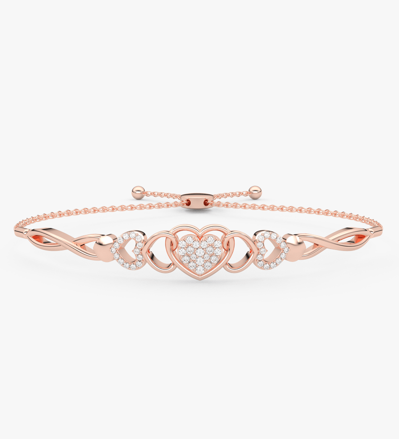 Bransoletka z brylantem serce w różowym złocie z delikatnym wzorem i migoczącymi kamieniami