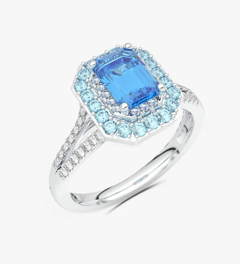 Elegancki pierścionek z niebieskim topazem i brylantami w srebrnej oprawie od Venetia Jewels