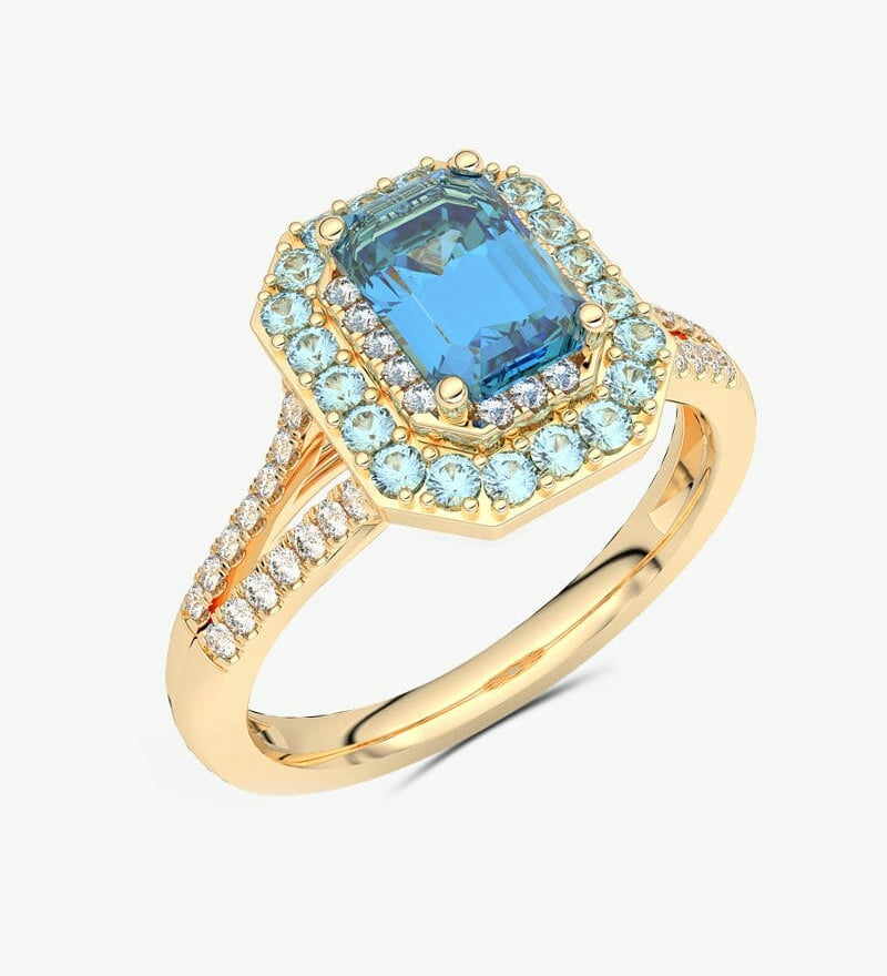 Złoty pierścionek z niebieskim topazem i brylantami w eleganckim designie dla miłośników biżuterii