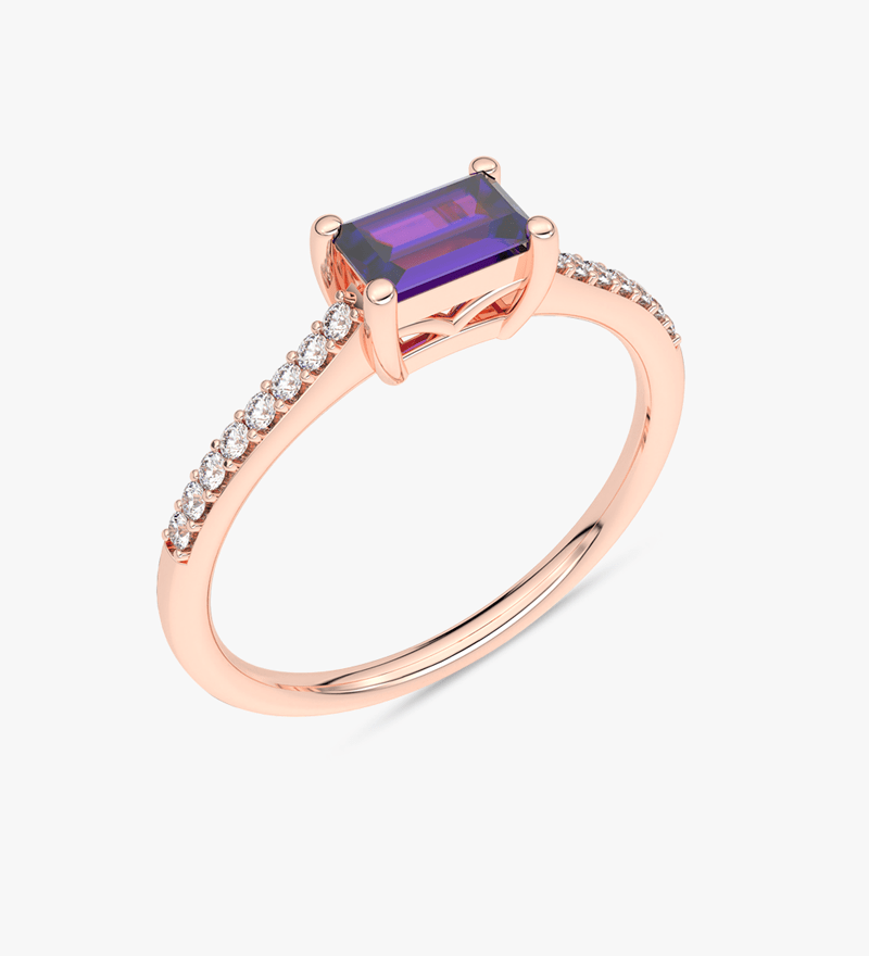 Pierścionek vintage z tanzanitem i brylantami na różowym złocie z eleganckim wykończeniem.