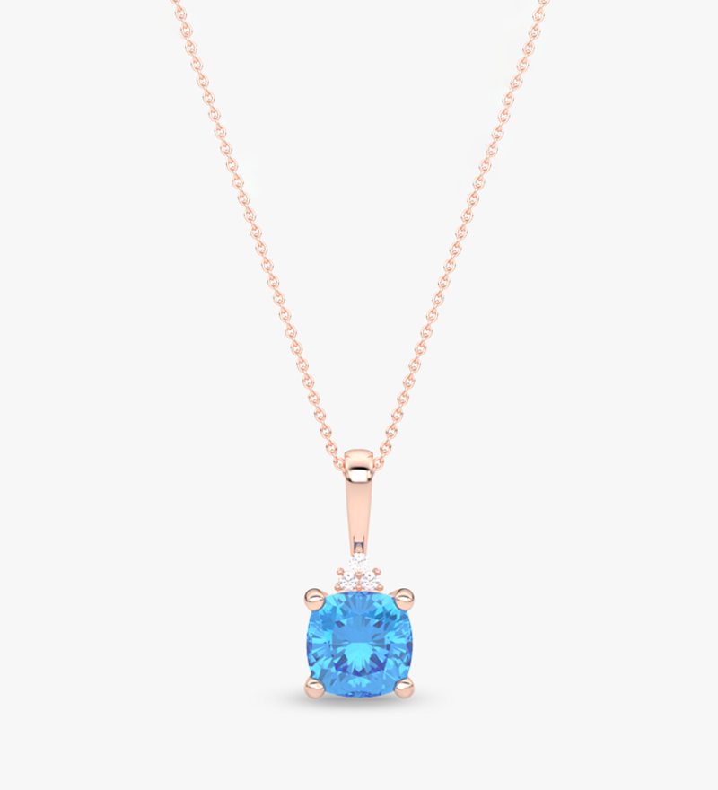 Wisiorek z niebieskim topazem na różowym łańcuszku z delikatnymi kryształkami dla eleganckich stylizacji